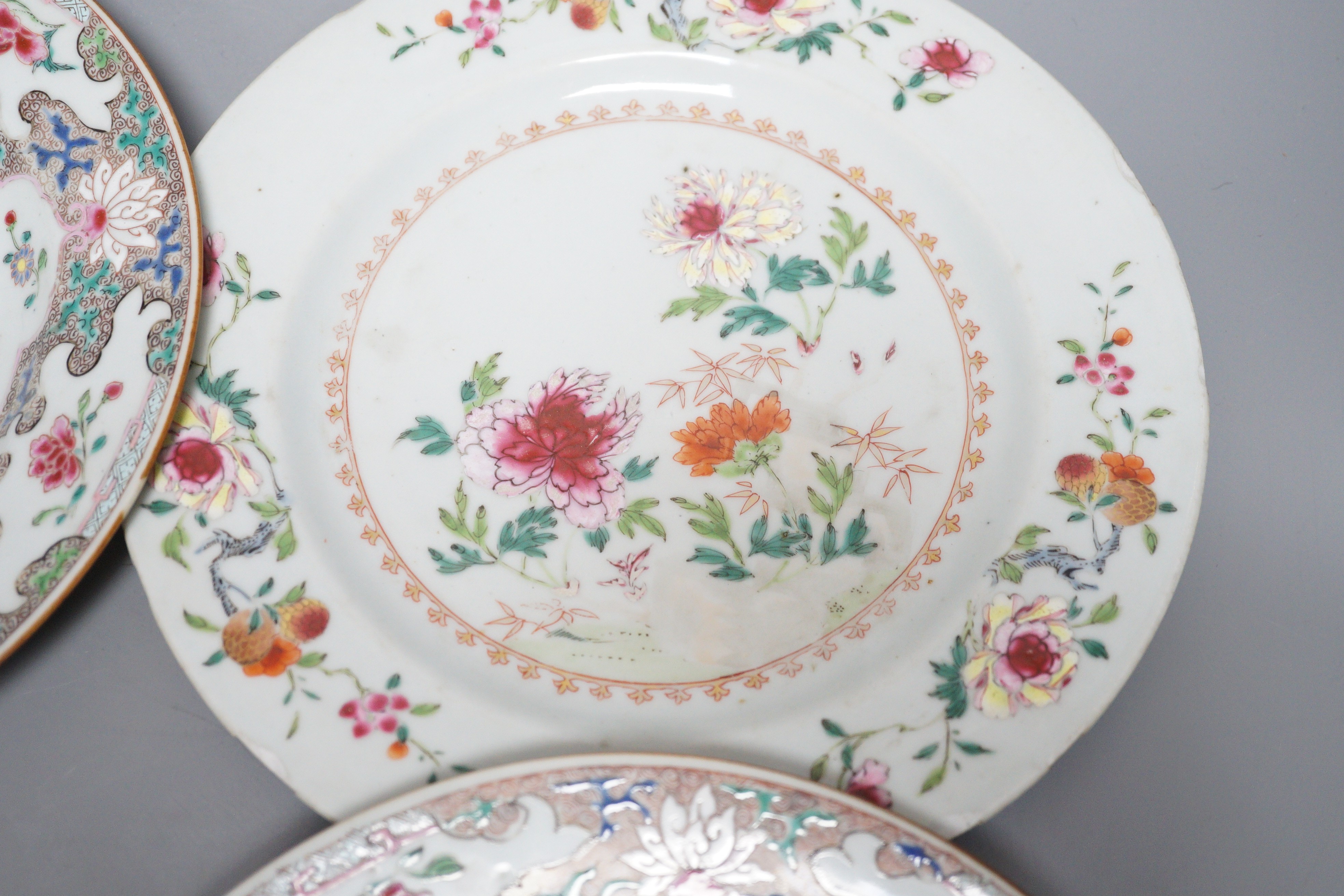 A pair of 18th century Chinese export famille rose plates and two others, largest 23cm